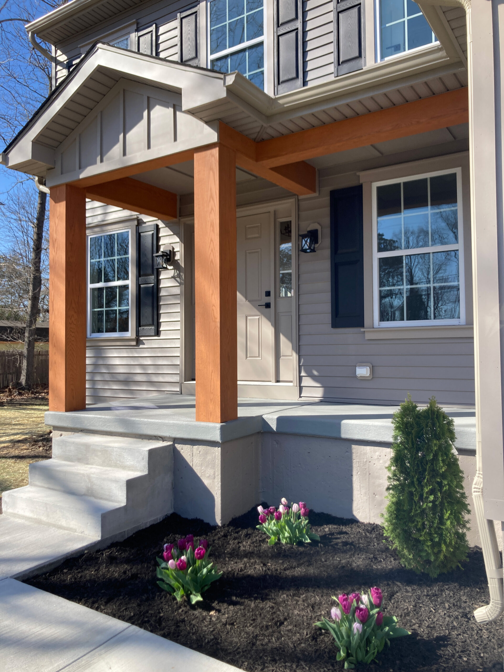 red oak wood beams and posts with batten board siding