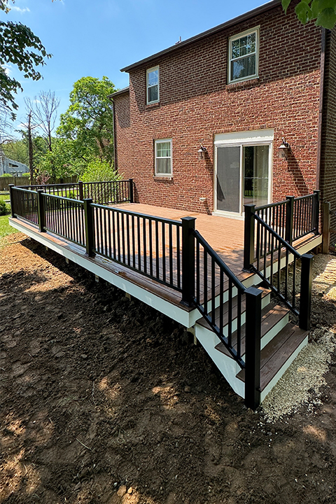 Trex Decking with Saddle Color and Black Aluminum Railings Brandywine